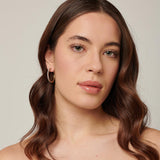 304 stainless steel medium hoop earrings, 14K gold pvd coating with clear cubic zirconia.|BEIE015