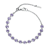 316L stainless steel bracelet with tanzanite color crystals.